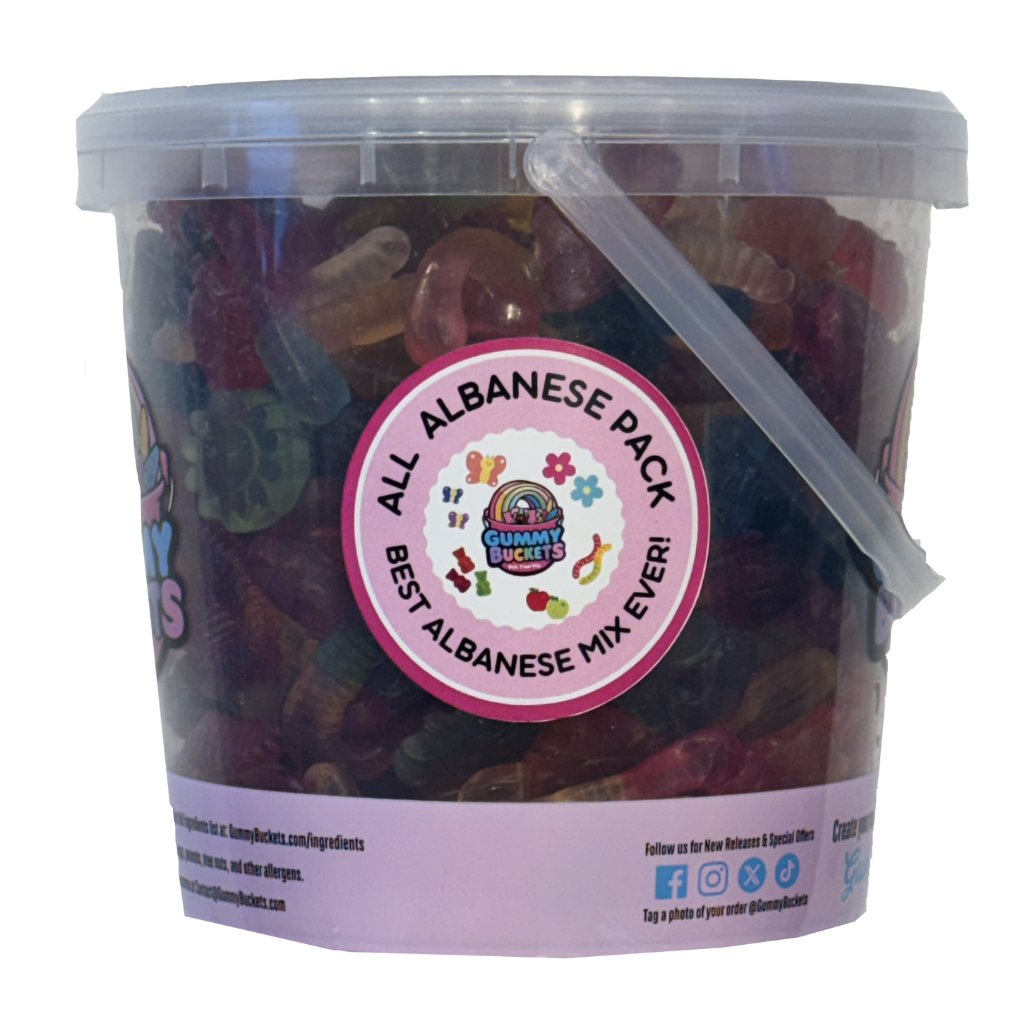 A clear plastic tub filled with assorted gummy candies, featuring a round pink and white label that reads 'ALL ALBANESE PACK BEST ALBANESE MIX EVER!' with the Cleary's Bakes logo. A translucent clear plastic scoop is attached to the side of the tub.