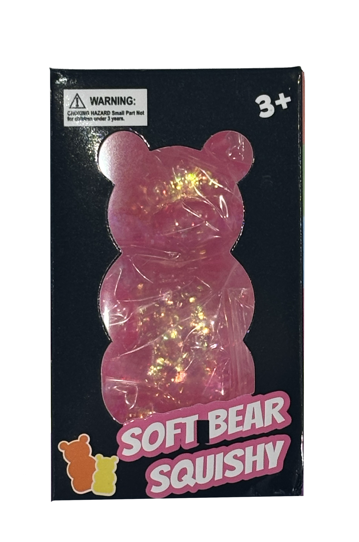 A pink glittery soft bear squishy toy inside its black retail packaging, featuring a warning label and '3+' age marking.