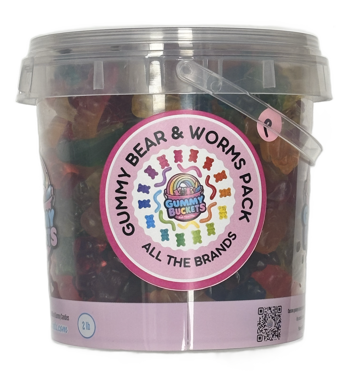 A clear plastic bucket filled with assorted gummy bears and worms gummy candy, featuring a pink circular label that reads 'GUMMY BEAR & WORMS PACK ALL THE BRANDS' with the Gummy Buckets logo in the center.