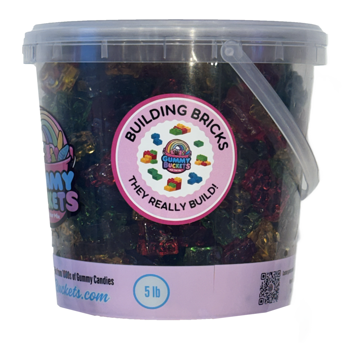 A 5 lb clear plastic bucket filled with assorted colorful gummy candies, featuring a pink and white label that reads 'Building Bricks They Really Build!' and the Chummy Treats logo.