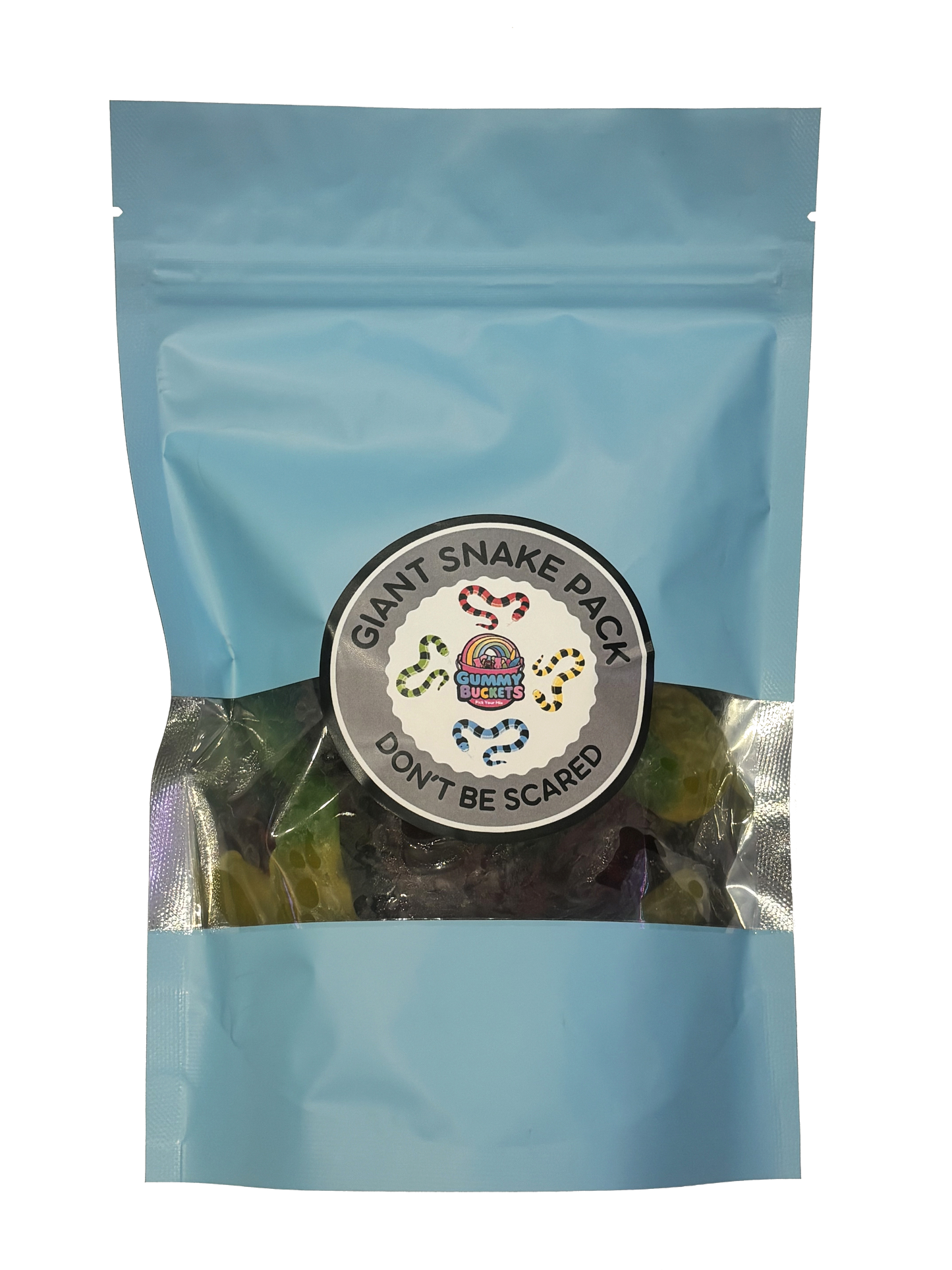 A light blue resealable stand-up pouch with a clear window showing large green and dark-colored giant snake-shaped gummy candies inside. A round dark gray label on the front reads 'GIANT SNAKE PACK' and 'DON'T BE SCARED' with the Gummy Buckets logo surrounded by illustrated colorful snake illustrations in the center.