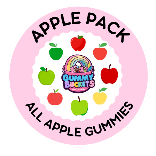 A circular pink graphic with the words 'APPLE PACK' at the top and 'ALL APPLE GUMMIES' at the bottom, surrounding a central logo that reads 'Gummy Buckets' with a rainbow and gummy characters. The design includes illustrated apples in green, red, and yellow around the center on a white scalloped background.