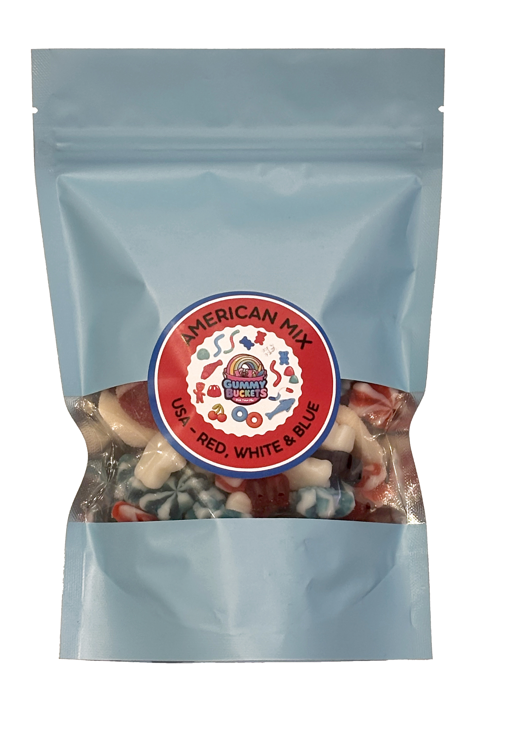 A light blue resealable stand-up pouch with a clear window showing red, white, and blue gummy candies including stars and swirled gummies inside. A round red and blue label on the front reads 'AMERICAN MIX' and 'USA – RED, WHITE & BLUE' with the Gummy Buckets logo in the center.