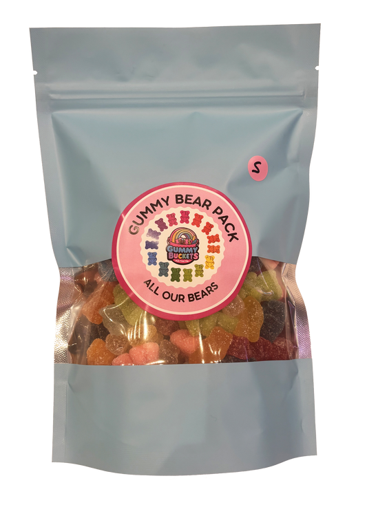 A stand-up resealable pouch of gummy bear candies with a clear window showing multicolored gummies inside. The pouch is light blue-gray with a large round pink label reading 'CUMMY BEAR PACK' and 'ALL OUR BEARS,' plus a small pink 'S' size sticker near the top right.