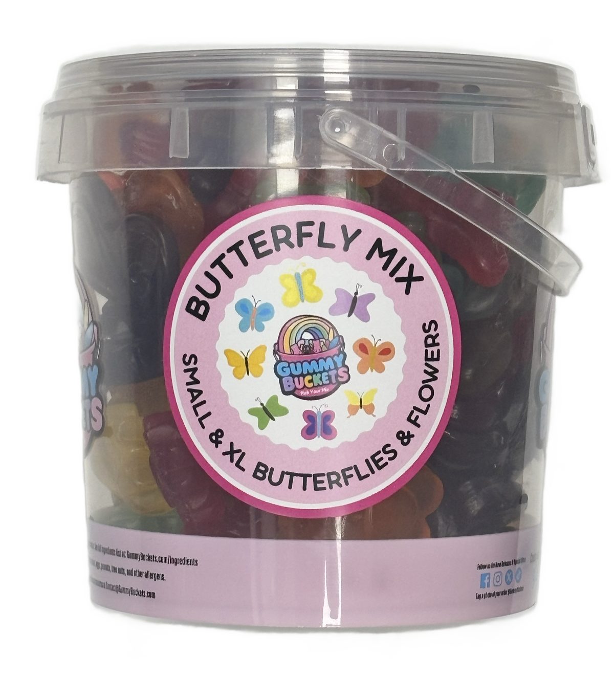 A clear plastic tub of gummy candies labeled 'BUTTERFLY MIX' with a pink circular sticker. The tub contains small and extra-large gummies in various colors, including red, yellow, green, and purple.