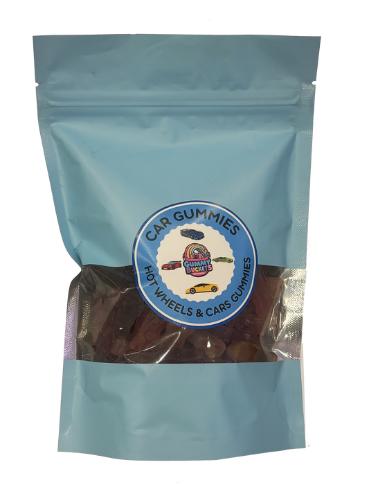 A light blue stand-up pouch of car gummies for wheels and cars, with a clear window showing the brown gummy candies inside. A circular logo on the front reads 'CAR GUMMIES FOR WHEELS & CARS GUMMIES' with a small cartoon car and wheel graphic.