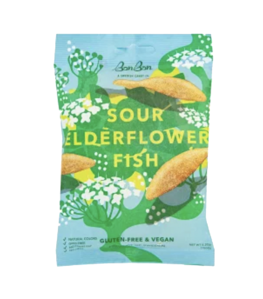 A bag of Son Bon Sour Elderflower Fish crackers, featuring a light blue and green illustration with white elderflowers and yellow fish pieces, on a plain white background.