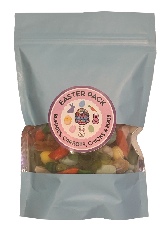 A light blue stand-up pouch of Easter treats with a clear window showing mixed candy pieces inside. A round pink label on the front reads 'EASTER PACK' and 'BUNNIES, CARROTS, CHICKS & EGGS' with bunny and rainbow illustrations.