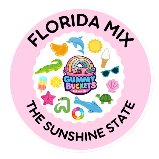 A circular pink sticker or label design with the text 'FLORIDA MIX' at the top and 'THE SUNSHINE STATE' at the bottom. The center features a white scalloped circle surrounded by colorful summer-themed illustrations, including a rainbow candy bucket, gummy bears, a dolphin, sunglasses, a seashell, a turtle, and tropical icons.