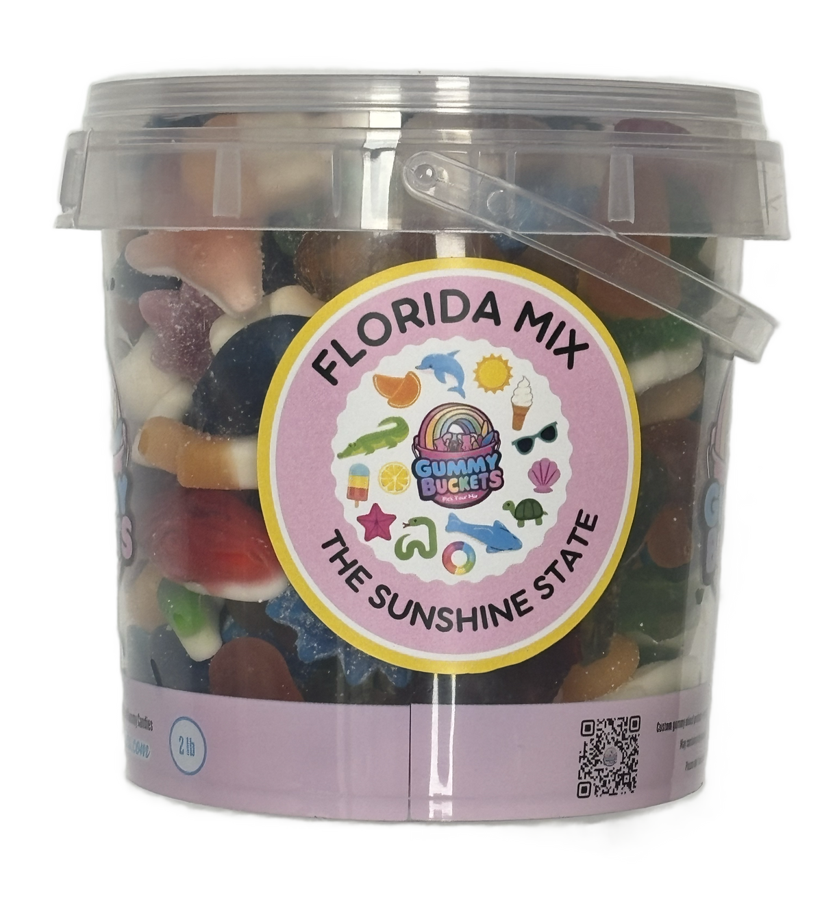 A clear plastic bucket filled with assorted gummy candies, featuring a round pink label that reads 'FLORIDA MIX' and 'THE SUNSHINE STATE' with 'Gummy Buckets' branding. The bucket has a translucent lid and a clear plastic handle, set against a plain white background.