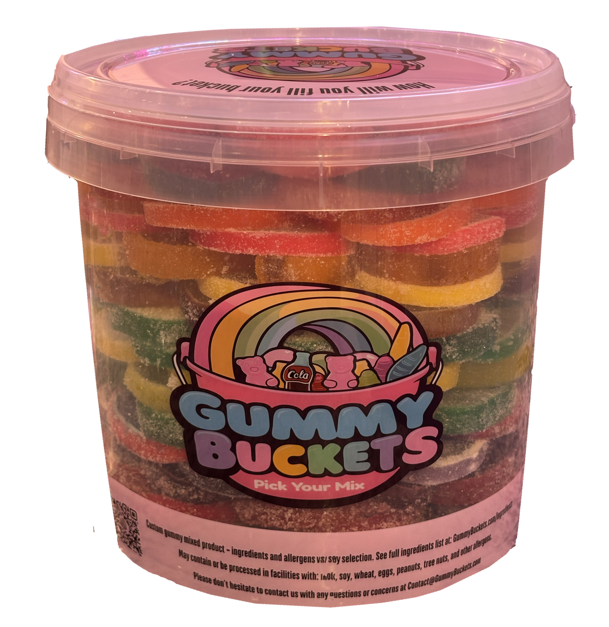 A clear plastic tub filled with assorted colorful gummy candies, featuring a pink lid and a large front label that reads 'Gummy Buckets Pick Your Mix' with a rainbow graphic.