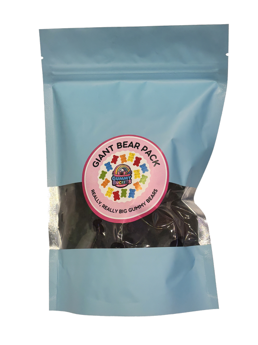 A light blue resealable stand-up pouch with a clear window showing large oversized gummy bears in red, orange, yellow, green, and purple inside. A round pink label on the front reads 'GIANT BEAR PACK' and 'REALLY, REALLY BIG GUMMY BEARS' with the Gummy Buckets logo surrounded by illustrated colorful giant gummy bear icons in the center.