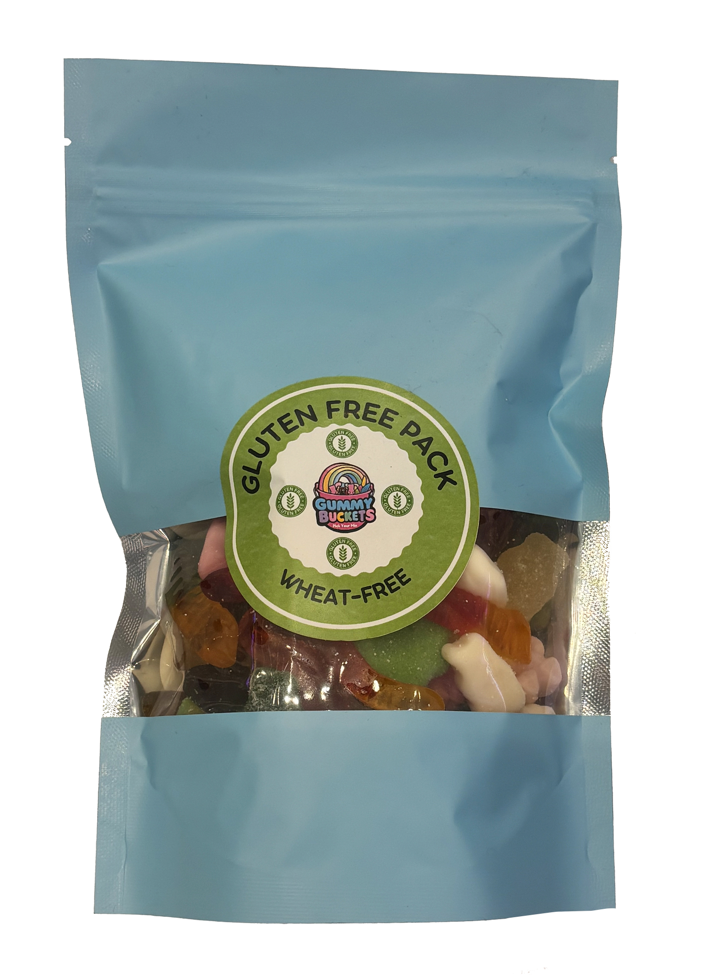 A light blue resealable stand-up pouch with a clear window showing a colorful assortment of mixed gummy candies including bears, worms, peach rings, and fruit shapes inside. A round green label on the front reads 'GLUTEN FREE PACK' and 'WHEAT-FREE' with the Gummy Buckets logo surrounded by illustrated wheat-free and gluten-free certification icons in the center.