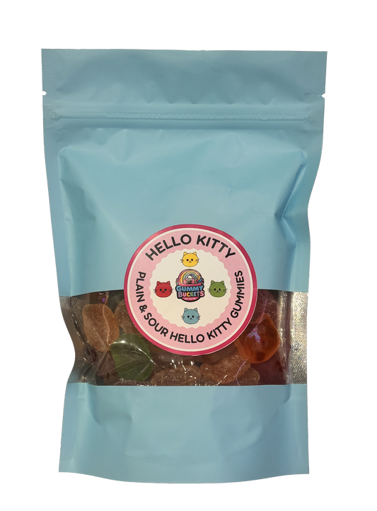 A light blue resealable stand-up pouch with a clear window showing large Hello Kitty-shaped gummy candies in red, orange, yellow, and green inside. A round pink label on the front reads 'HELLO KITTY' and 'PLAIN & SOUR HELLO KITTY GUMMIES' with the Gummy Buckets logo surrounded by illustrated colorful Hello Kitty cat face icons in the center.