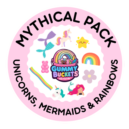A circular pink label or sticker with the words 'MYTHICAL PACK' and 'UNICORNS, MERMAIDS & RAINBOWS' in black text, surrounding a central illustration of a rainbow bucket with gummy bears and cute fantasy icons.
