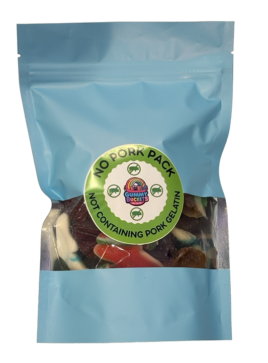 A light blue stand-up pouch of gourmet biscuits containing multicolored gummy candies, with a circular green and white label reading 'NO PORK PACK' and 'NOT CONTAINING PORK GELATIN'.