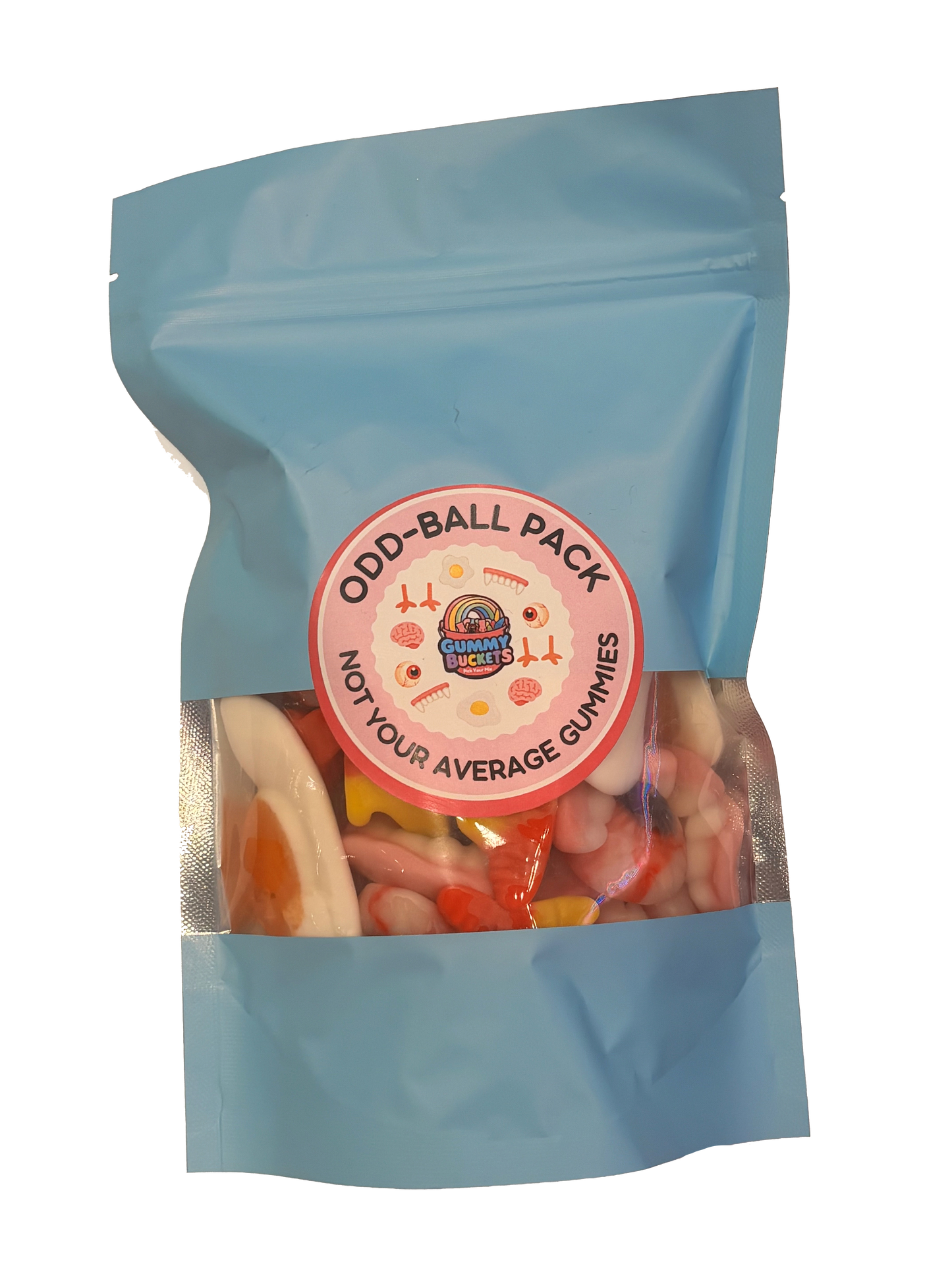 A light blue stand-up pouch of 'Odd Ball Pack' gummy candy, featuring a clear window that displays an assortment of colorful, irregularly shaped gummies. The pouch has a circular pink and white label in the center.