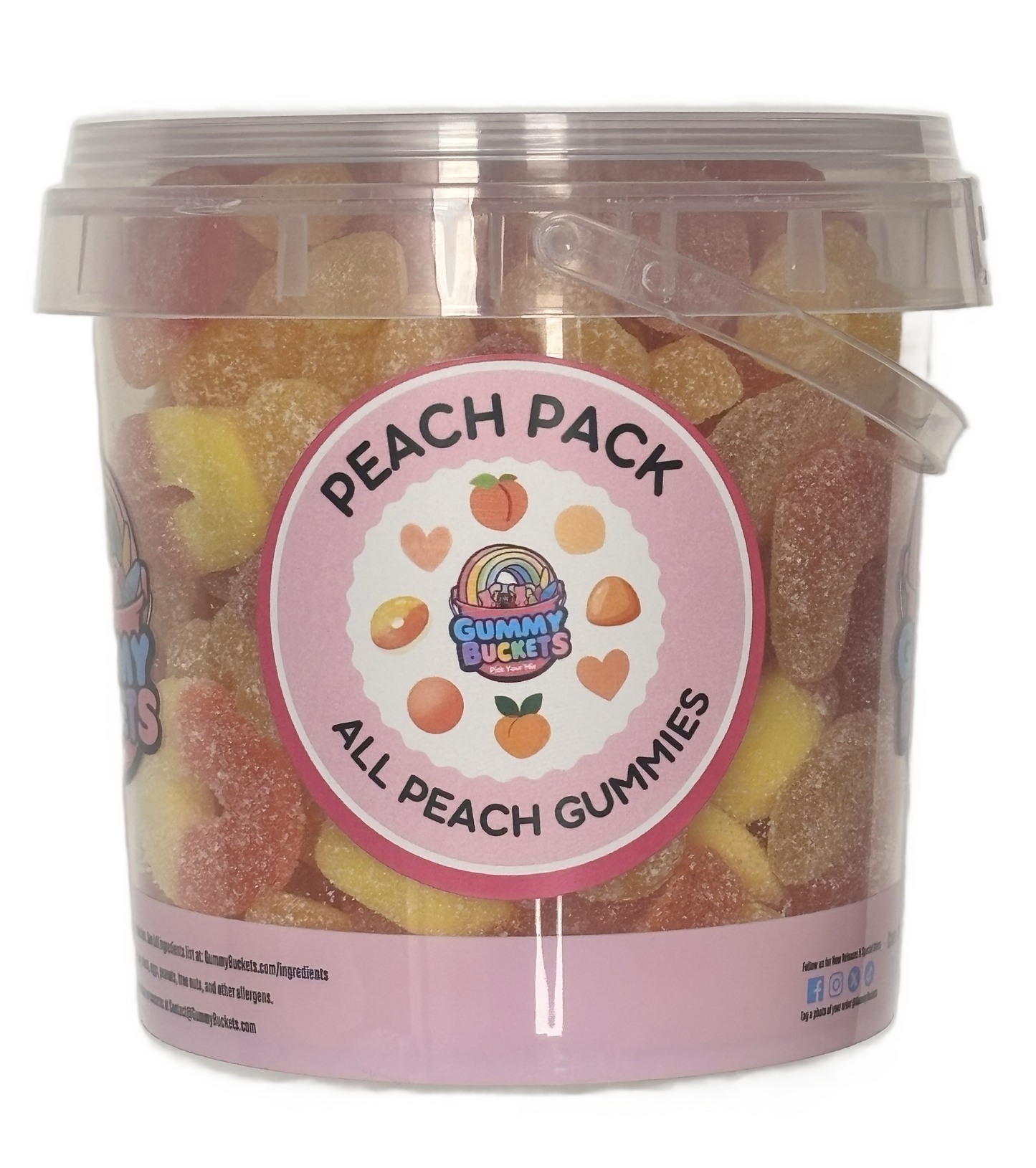 A clear plastic bucket filled with assorted peach-colored gummy candies, featuring a round pink label that reads 'PEACH PACK' and 'ALL PEACH GUMMIES' with the Gummy Buckets logo.