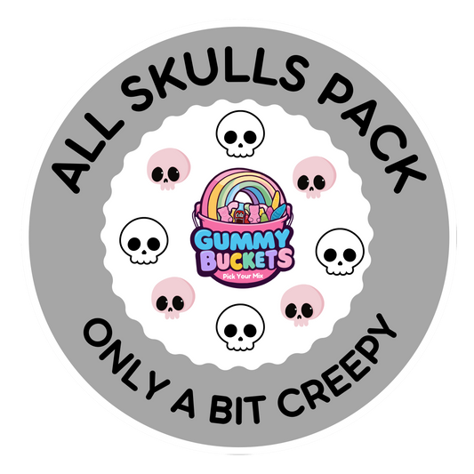 A circular graphic label for a 'Gummy BUCKETS' product collection titled 'ALL SKULLS PACK' with the tagline 'ONLY A BIT CREEPY'. The design features a gray outer ring, a white scalloped inner ring, and a central colorful logo of a rainbow gummy bucket.
