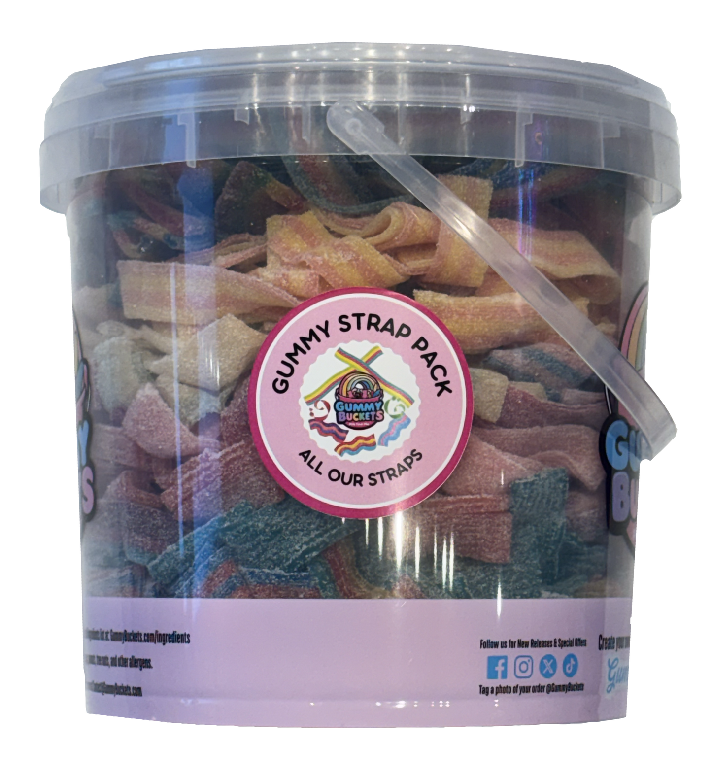 A clear plastic bucket filled with assorted gummy straps candies, featuring a pink circular label that reads 'Gummy Strap Pack - All Our Straps' and a translucent lid with a clear plastic handle.