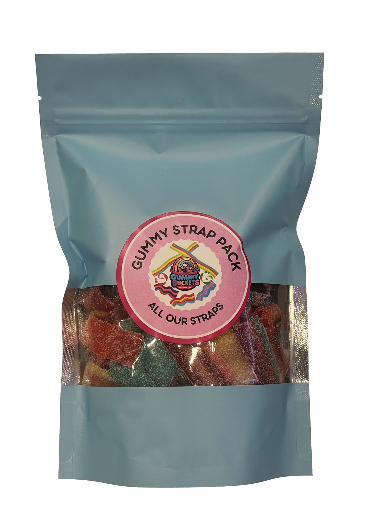 A light blue resealable stand-up pouch with a large clear window showing a colorful assortment of flat gummy strap candies in red, orange, blue, and green inside. A round pink label on the front reads 'GUMMY STRAP PACK' and 'ALL OUR STRAPS' with the Gummy Buckets logo surrounded by illustrated colorful crossed strap candy icons in the center