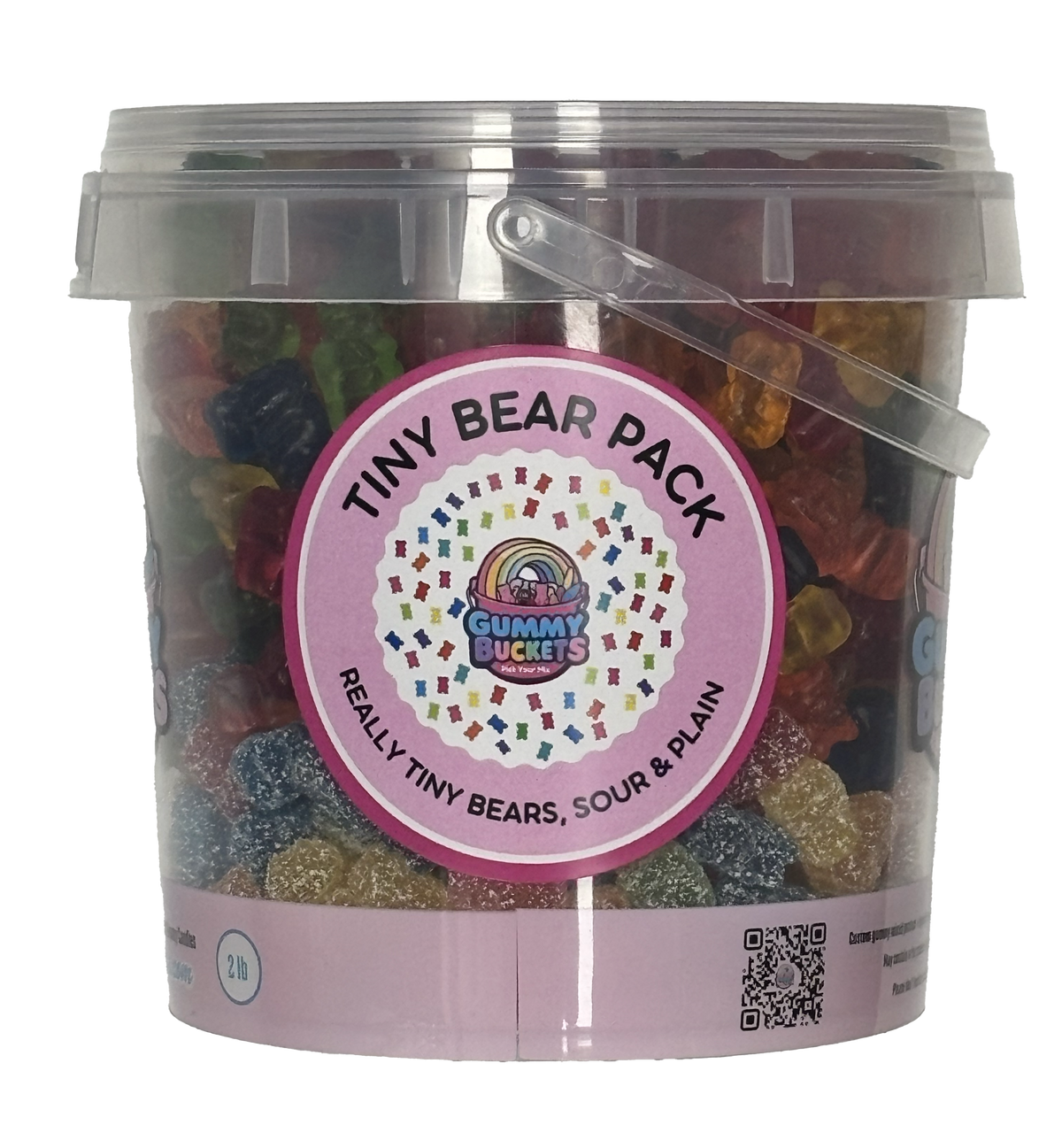 A clear plastic tub filled with assorted gummy bears, with a pink circular label reading 'TINY BEAR PACK' and 'Gummy Buckets' in the center, photographed on a white background.