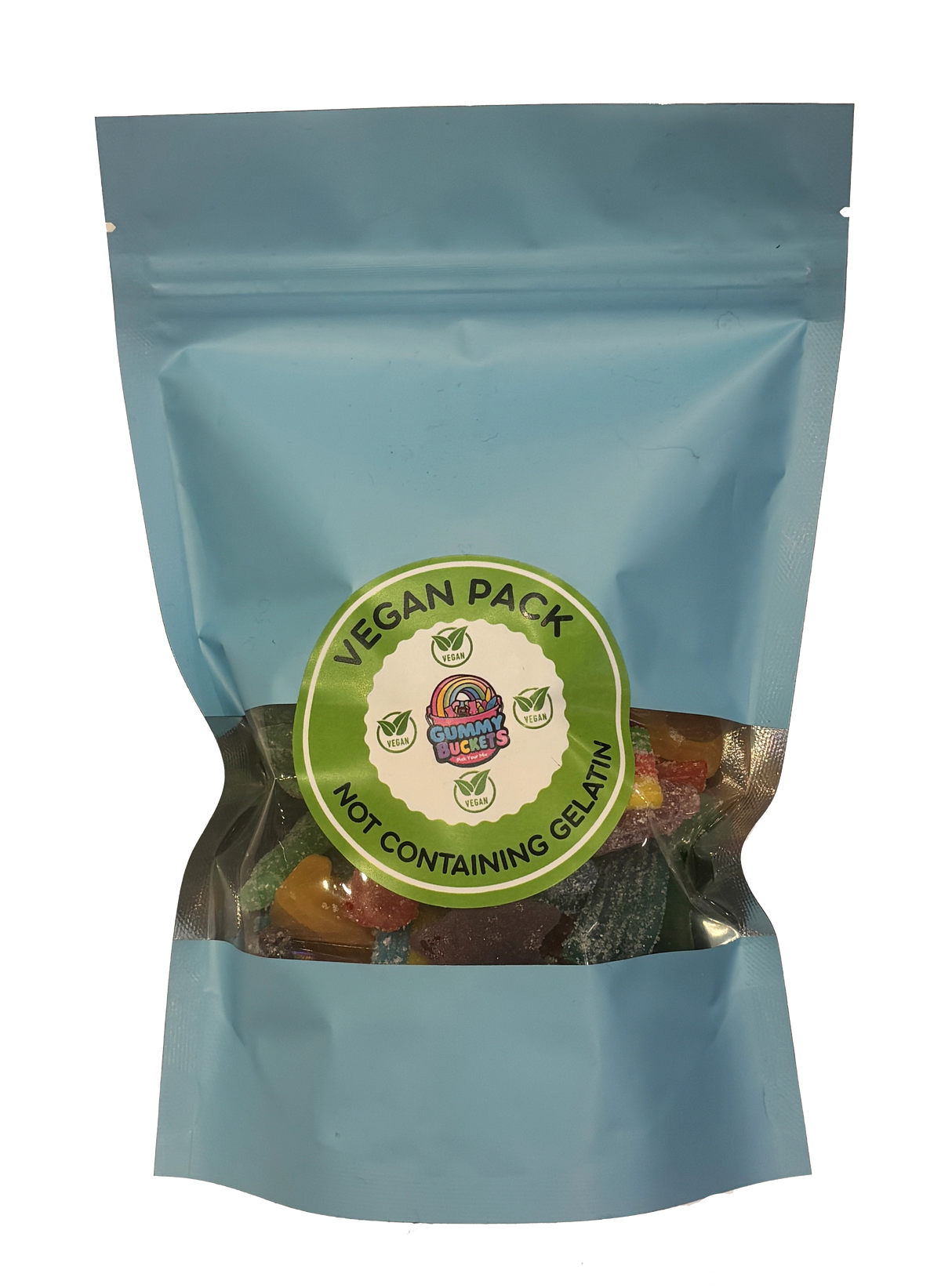 A light blue resealable stand-up pouch with a large clear window showing a dark, rich assortment of vegan gummy candies including bears, cola bottles, and fruit shapes in deep red, black, yellow, and green inside. A round green label on the front reads 'VEGAN PACK' and 'NOT CONTAINING GELATIN' with the Gummy Buckets logo surrounded by four green vegan leaf certification icons in the center.