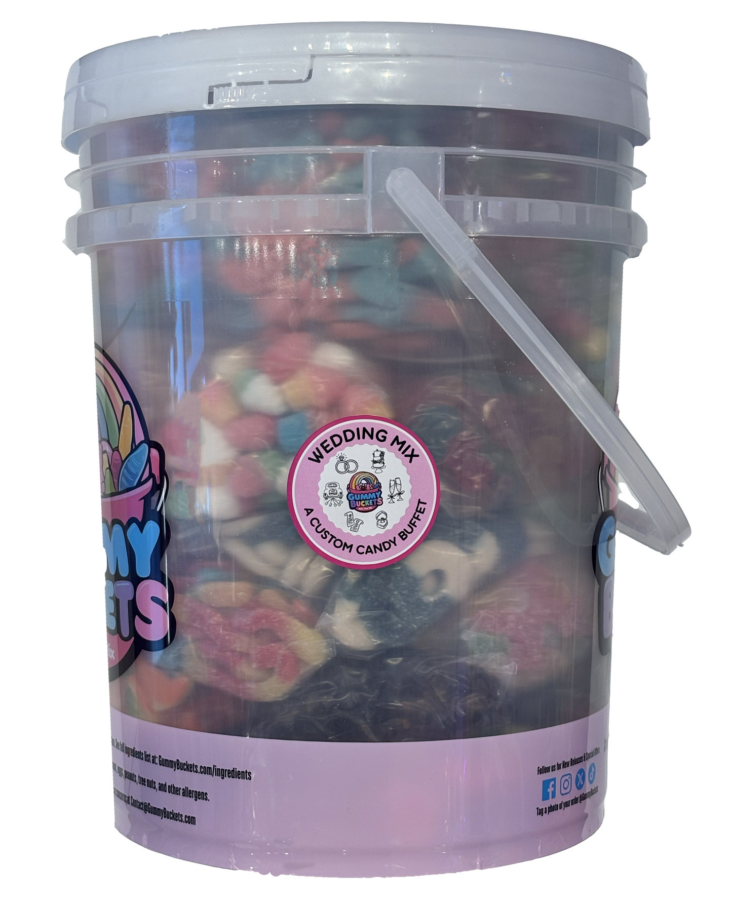 A large clear plastic bucket filled with assorted colorful cotton candy, with a white lid and handle. The bucket has a pink label that reads 'My Pets Wedding Mix Cotton Candy Buffet' and a circular sticker on the front.